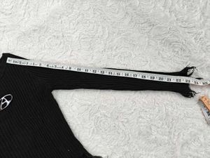 Distressed Black Knit Sweater