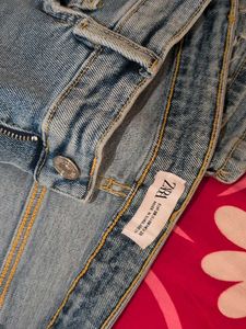 Distressed Light Wash Denim Jeans