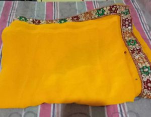 Elegant Yellow Saree with Embellishments