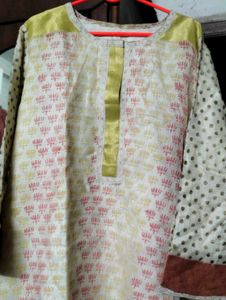 Cream Printed Nice Kurti.