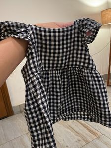 Checked top with flutter sleeves