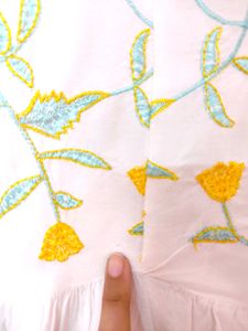White Top With Yellow And Light Blue Embroidery