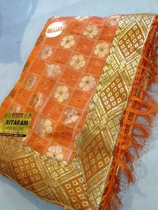 Organe Colour Saareee.                                     Fully Laced Saaree Blouse Attach Within.                            No coins/No Swap