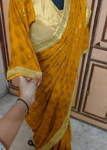 Elegant Mustard Saree with Gold Border