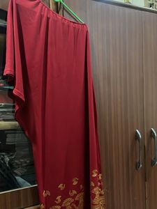 Red one shoulder dress with slit