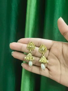White Earrings Amd Golden Jhumkas.
