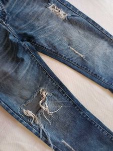 Distressed Blue Wash Denim Jeans