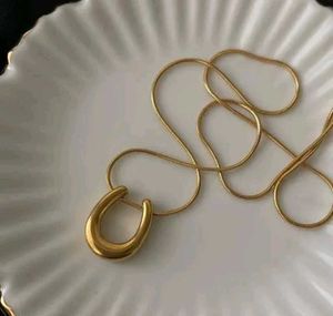 Gold Horseshoe Pendant Necklace