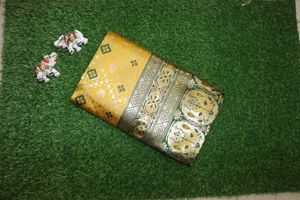 Yellow Silk Saree with Green Border