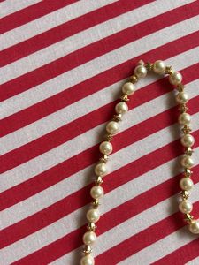 PEARL NECKLACE WITH GOLD DETAILS