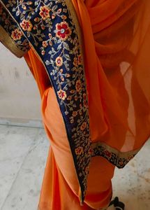 Elegant Orange Embroidered Saree 💕