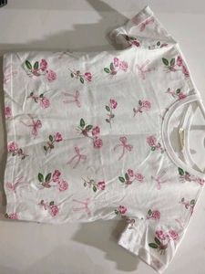 A Crop Top With Bows On It