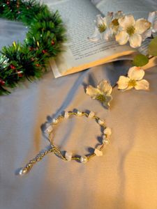 wire wrapped rose quartz and pearl bracelet