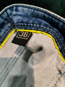 Distressed Denim Jeans