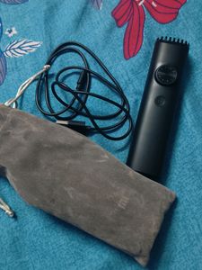 MI TRIMMER NEW CONDITION