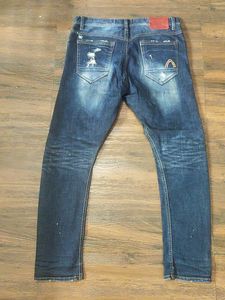 Distressed Denim Jeans
