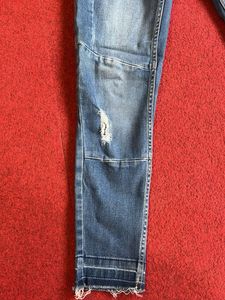 Distressed Denim Jeans