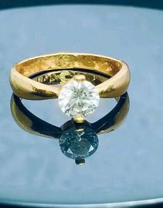 Gold Ring with Round Cut Stone
