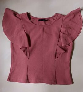 a cute top with ruffle sleeves.