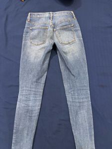 Distressed Denim Jeans