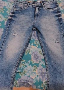 Distressed Denim Jeans