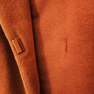 orange statement coat 🧥