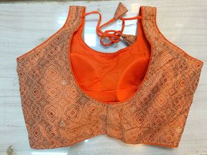 Sleeveless Orange Blouse