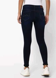 Mid Rise 5 Pocket Skinny Jeans