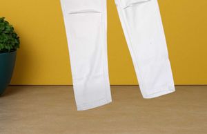 M@02 Size-32 Ripped White Jeans