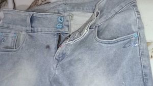 Distressed Gray Denim Jeans