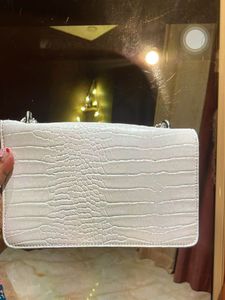 Lino Perros Sling Purse