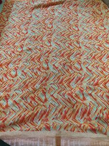 Elegant Orange Patterned Saree