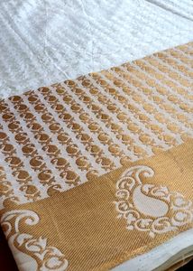 Brown Bordered White Saree For Festivals