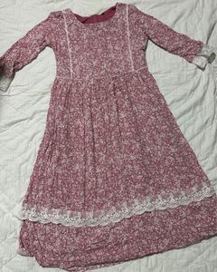 a pink and white flower printed dress