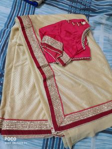 pretty red golden saree.