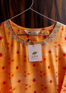 Soft Peach Kurti with Red Dots