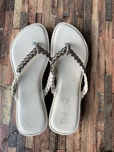 White braided sandals