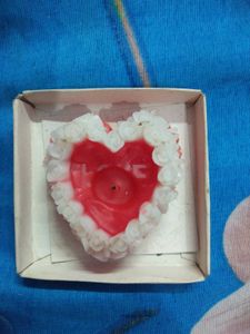 Heart-shaped 'LOVE' Candle
