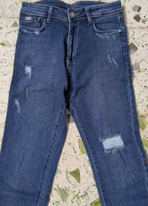 Pink Knit Top with blue denim jeans