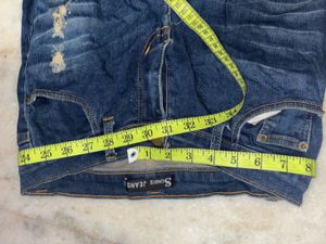 Distressed Blue Jeans