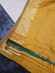 Elegant Mustard Saree with Gold Border