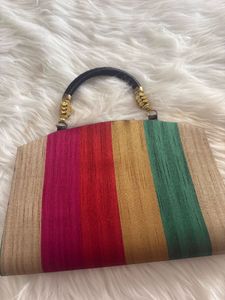Striped Clutch with Unique Handle