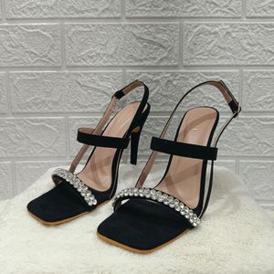 Elegant Black Heels with Rhinestone Detail