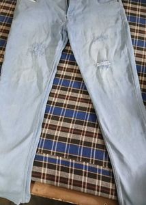 Ripped Light Wash Denim Jeans