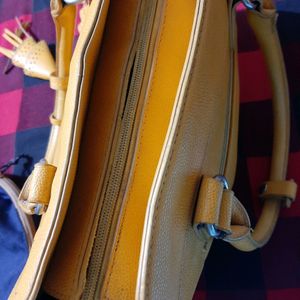 Diana Korr mustard coloured bag
