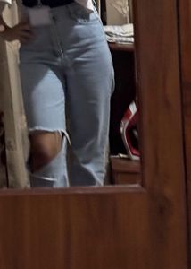 Ripped Light Wash Denim Jeans