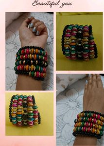 This is a colorful boho-style beaded bracelet stac