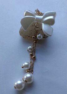 Pearl Bow Dangle Earrings