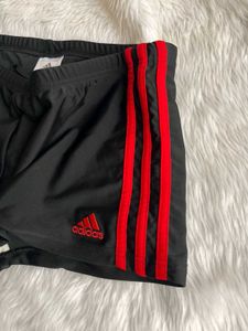 Adidas black three striped red mini shorts