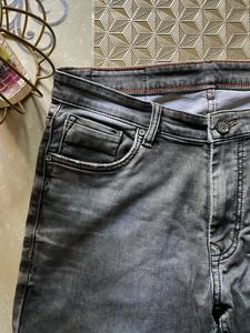 Ripped Grey Jeans
